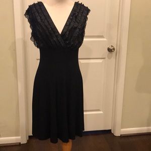 Black alone dress with silver accented fringe bust